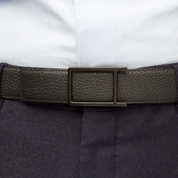 Buckle classic black lacquer worn on a belt